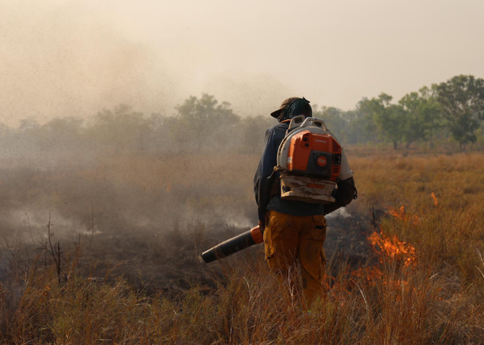 Jordie Rieniets, Australian Wildlife Conservancy Senior Land Management Officer, conducts prescribed burning to reduce fuel load post-floods. 